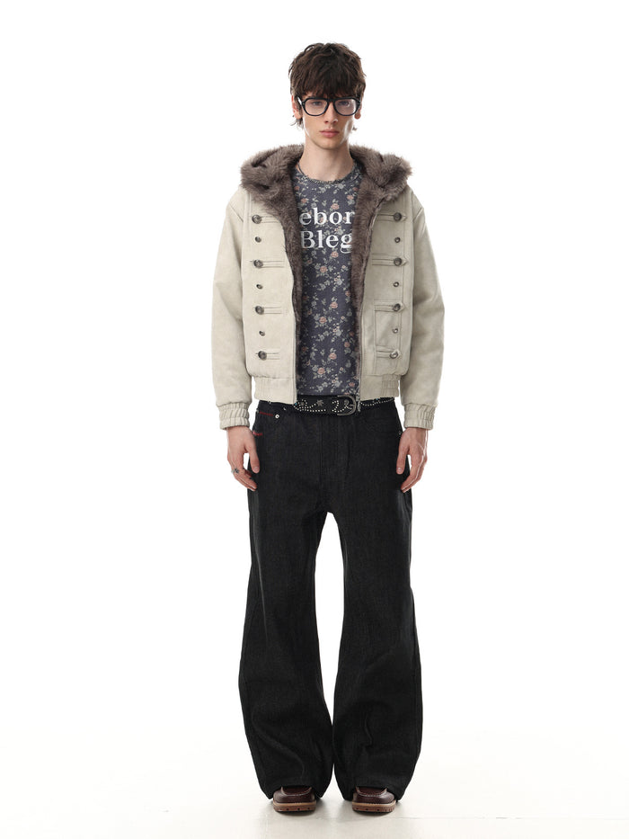 Model wearing a cream button bomber jacket with a fur-trimmed hood and ribbed hem