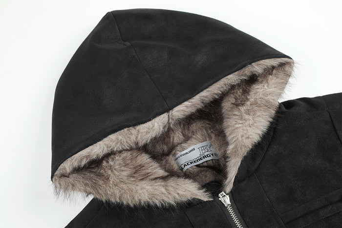 Close-up of the black bomber jacket hood showing its soft brown fur trim and inner label