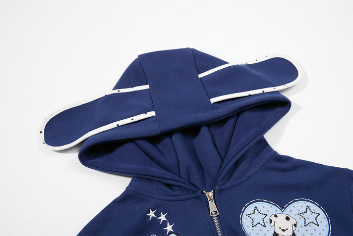 Close-up of the navy hoodie hood showing its ear-shaped design, white edging and front neckline