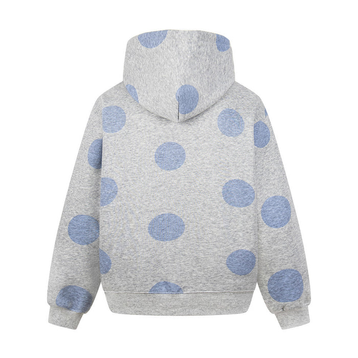 Back view of a gray pullover hoodie covered in blue polka dots with ribbed cuffs and hem