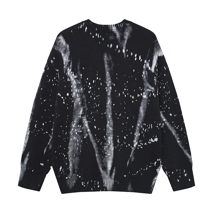 Black knit crewneck sweater with gray streaks and white speckles shown from the back