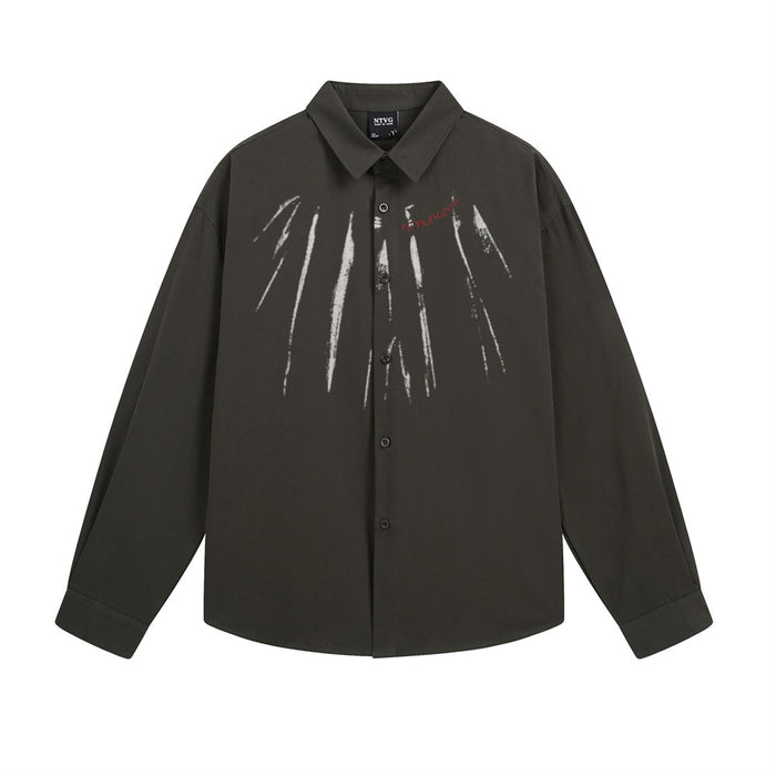 Black long-sleeve button-up shirt with white vertical paint-stroke graphics and small red chest lettering