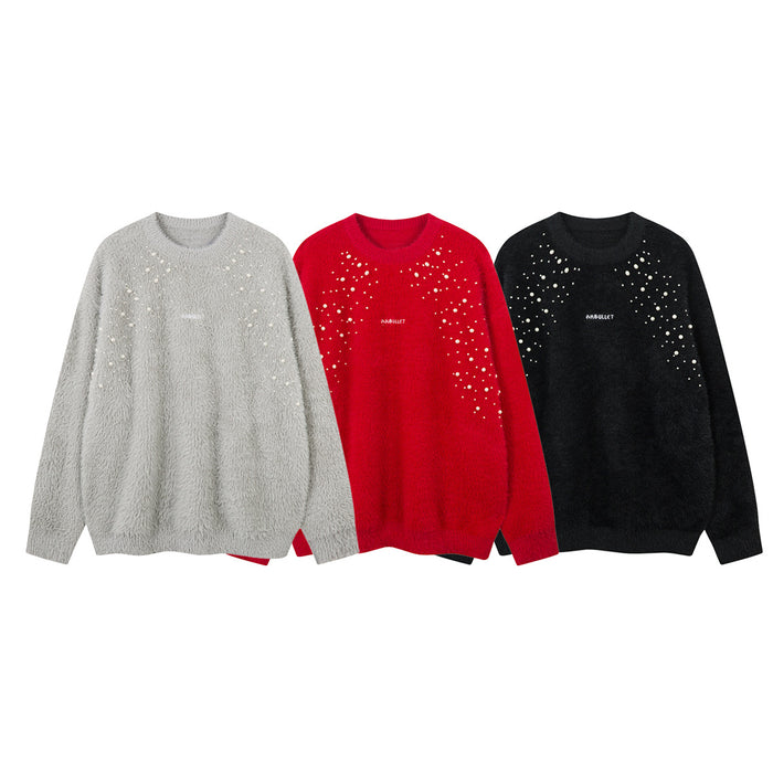 Three fuzzy knit crewneck sweaters in light gray, red, and black with pearl-studded fronts
