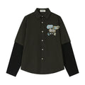 Oversized plaid faux two-piece long sleeve shirt with contrast knit sleeves and letter embroidery patch on left chest