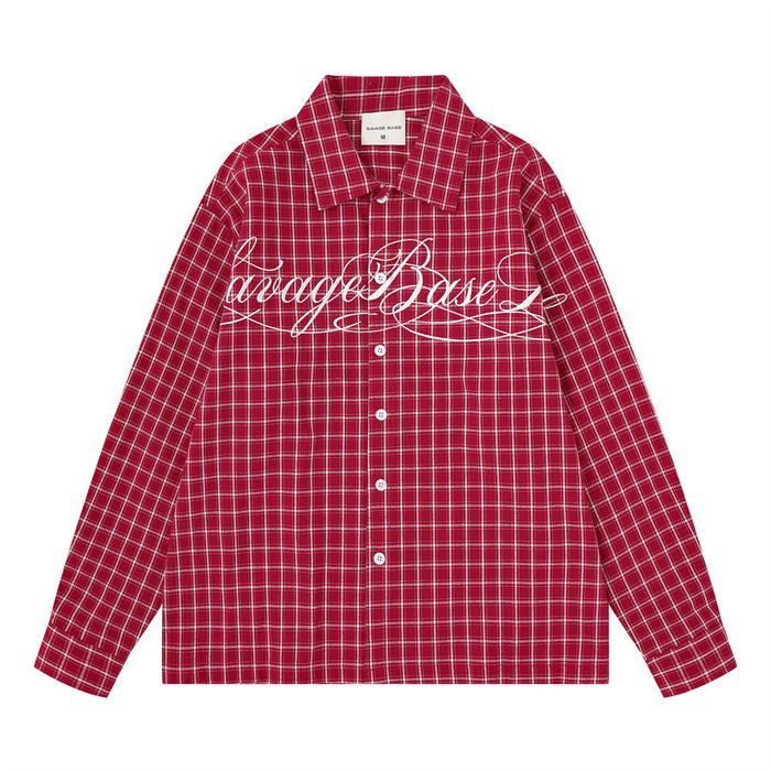 Front view of a red plaid long sleeve shirt with white cursive chest embroidery and white buttons