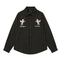 Oversized plaid long-sleeve shirt with white Pegasus embroidery and red star accents on chest, shown in dark olive-black and