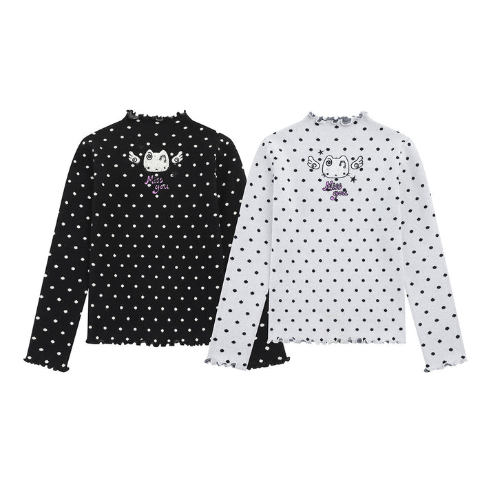 Black and white polka dot mock neck knit tops with cat graphics and lettuce trim