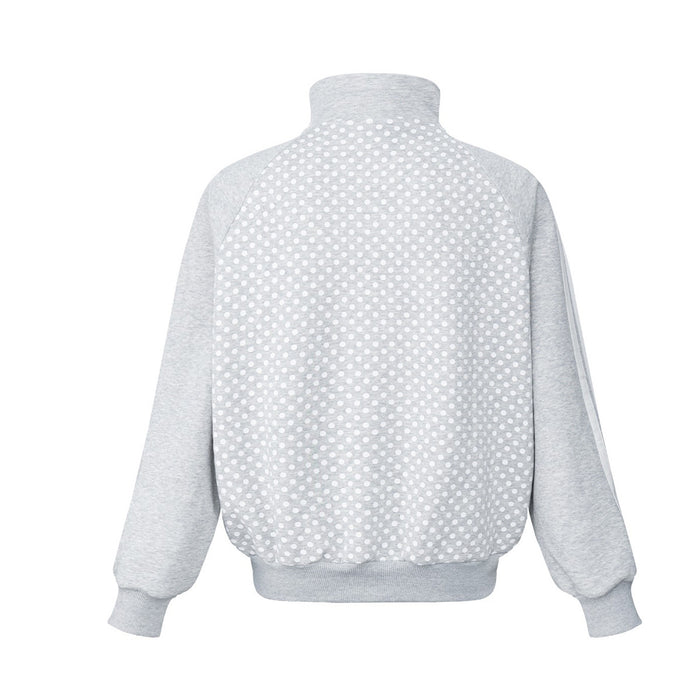 Back view of light gray track jacket with a full white polka-dot back panel and solid sleeves