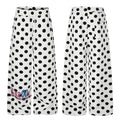 White wide-leg pants with black polka dots shown in front and back views, including a colorful lower-leg graphic