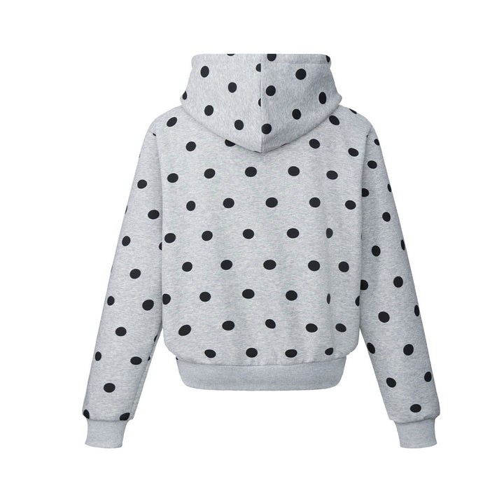 Back view of the gray polka dot hoodie showing its oversized hood, sleeves, and ribbed hem