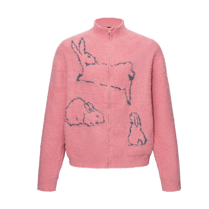 Front view of the pink zip-up knit sweater with three dark rabbit outline graphics