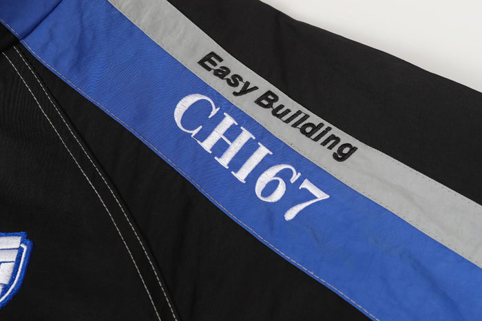 Close-up of the blue and gray shoulder stripe with Easy Building and CHI67 text