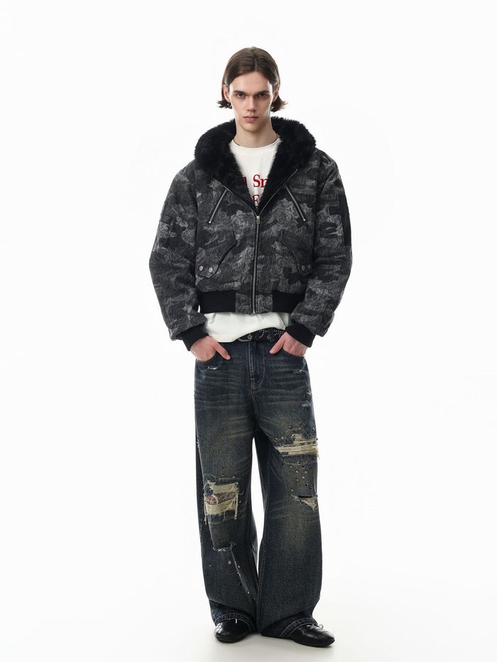 Model wearing the gray and black rose-pattern camouflage bomber jacket in a front view