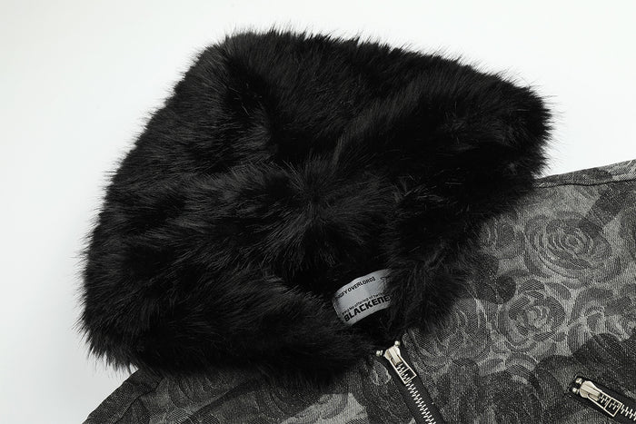 Close-up of the jacket's plush black faux fur collar and upper camouflage fabric