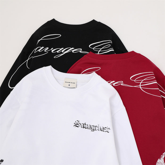 Overlapping black, red, and white long sleeve tees showing script back graphics and small chest lettering