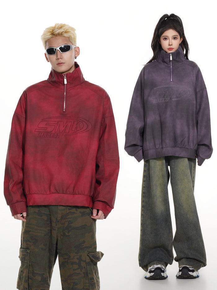 Red and charcoal half-zip stand-collar pullovers shown on two models from the front
