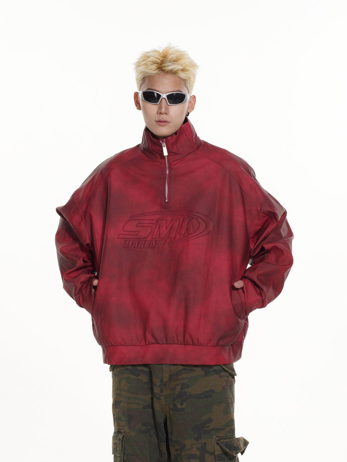 Front view of a red stand-collar half-zip pullover with hands in the side pockets