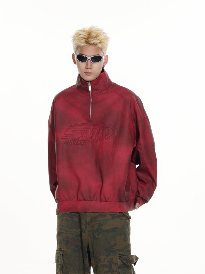 Red acid-wash half-zip pullover shown frontally with a raised chest logo and elastic hem