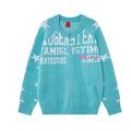 Front view of the turquoise knitted zip-up cardigan with white stars and large letter print