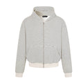 Oversized boxy striped zip-up hoodie in cream white with fine horizontal stripes, ribbed cuffs, and full-length front zip