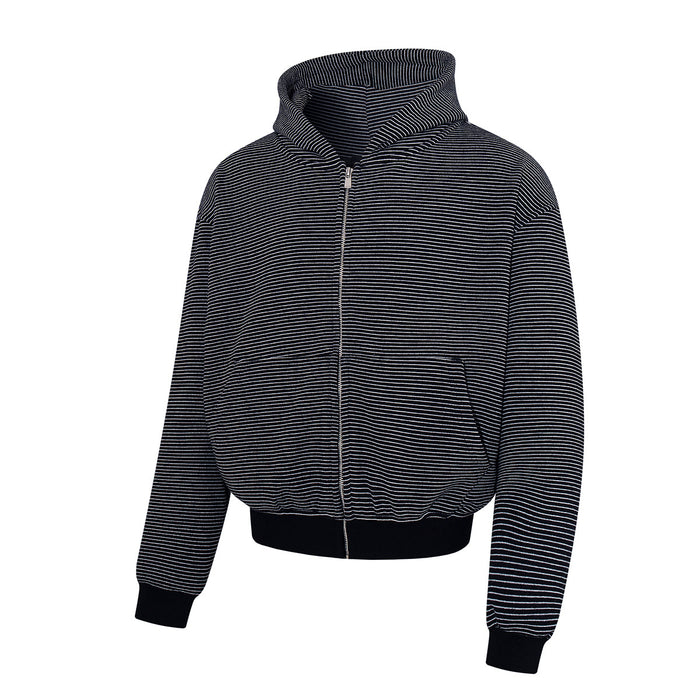 Angled front view of a black striped zip-up hoodie with a raised hood and full-length zipper
