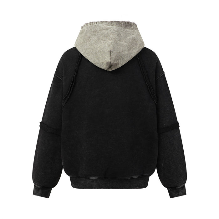 Black pullover hoodie shown from the back with a contrasting light gray raw-edge hood