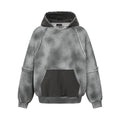 Gray acid-washed pullover hoodie front with a dark kangaroo pocket and raw-edge seam details