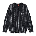 Black oversized crew neck knit sweater with vertical distressed white stripes, ribbed trim, and chest script logo