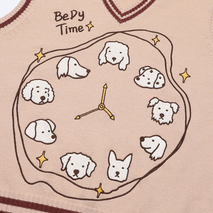 Close-up of the pink sweater vest showing a dog-themed clock graphic with stars and BeDy Time text