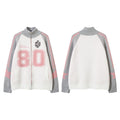 Front and back views of the white knit cardigan with gray sleeves, pink stripes, and number 80