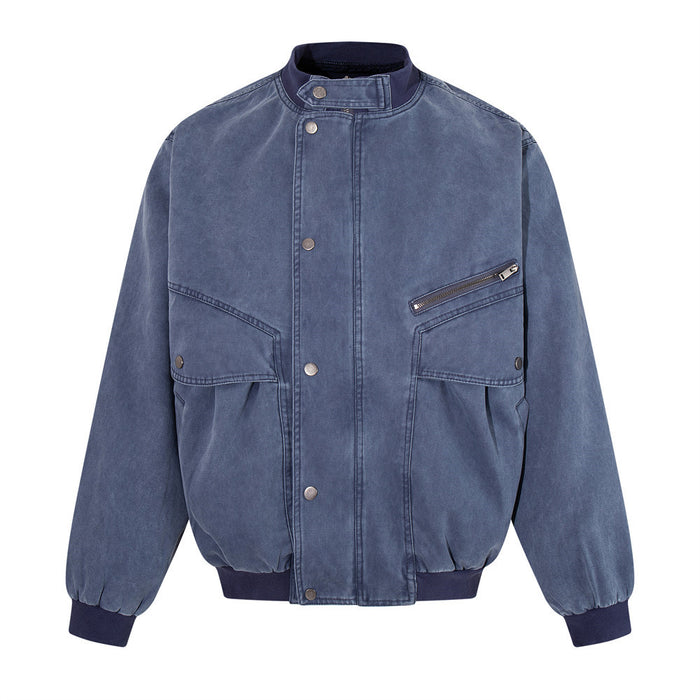 Men's oversized washed canvas bomber jacket in steel blue with stand collar, snap-button front, and large cargo pockets