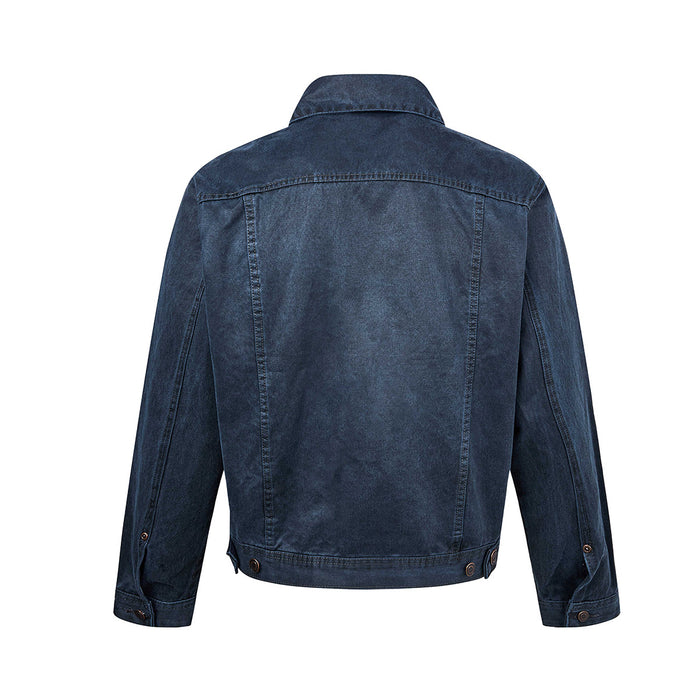 Blue washed denim trucker jacket back view showing the plain panel, seams, sleeves, and hem