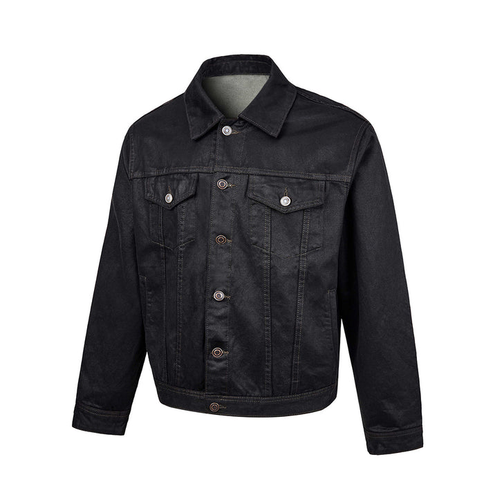 Black washed denim trucker jacket angled front view showing the collar, chest pockets, seams, and metal buttons
