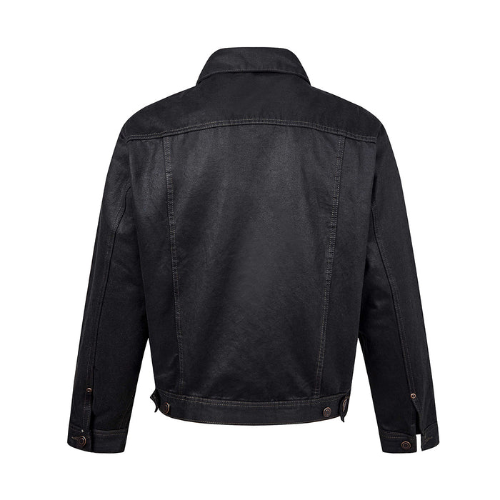 Black washed denim trucker jacket back view with panel seams, adjustable hem tabs, and buttoned cuffs