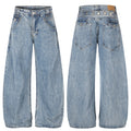 Light blue washed denim barrel-leg jeans shown from the front and back with wide legs and multiple pockets