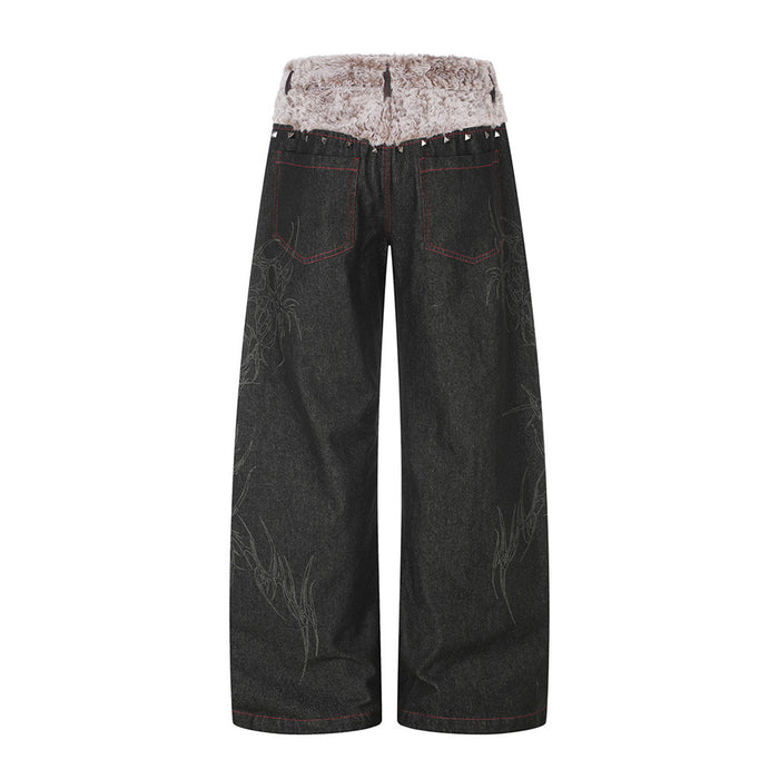 Back view of black wide-leg jeans with two red-stitched pockets, faux fur waistband and subtle tonal motifs