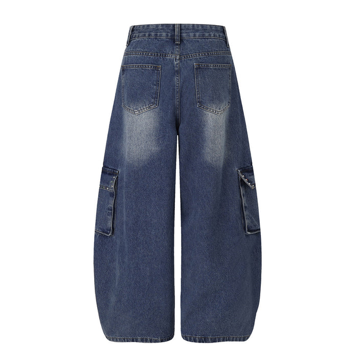 Back view of dark blue wide-leg cargo jeans with two rear pockets and flap cargo pockets