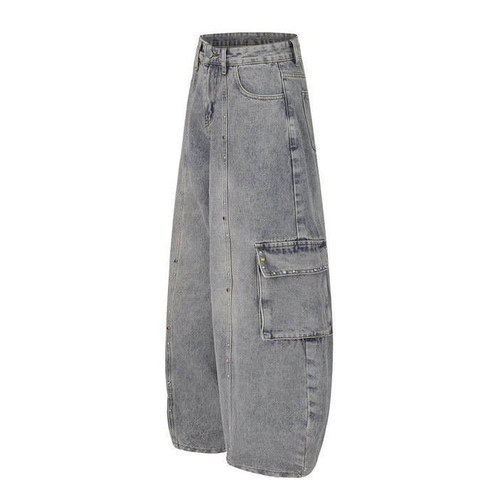 Washed gray wide-leg cargo jeans shown at a side angle with a large flap pocket and rhinestone seam accents