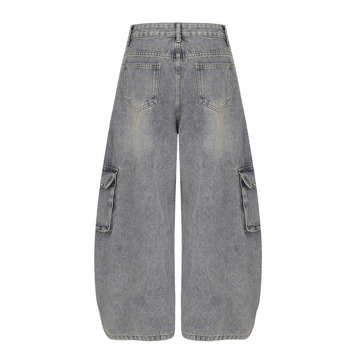 Back view of washed gray wide-leg cargo jeans with two rear pockets and side cargo pockets