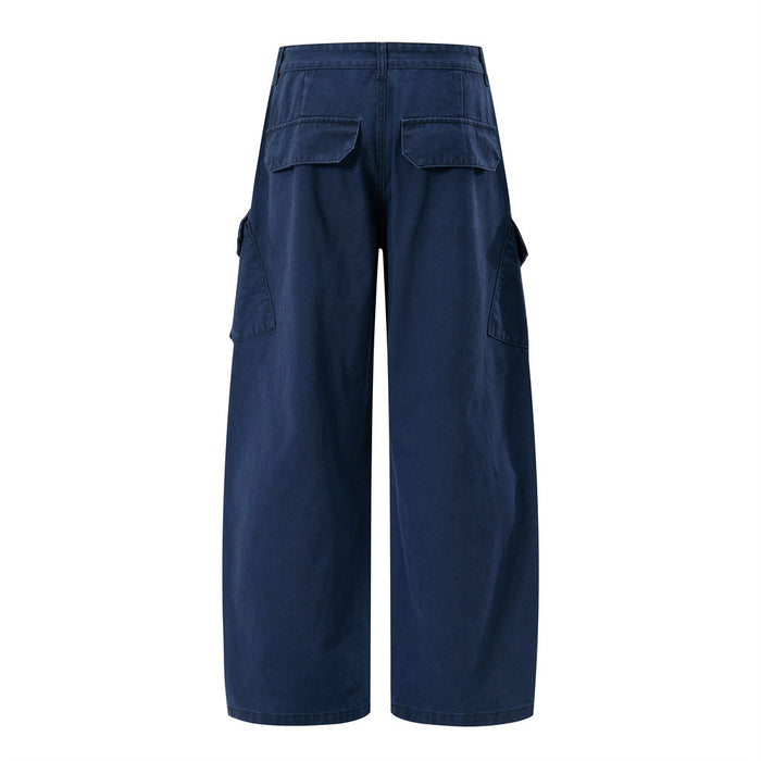Back view of navy blue wide-leg cargo pants with two flap back pockets and side cargo pockets