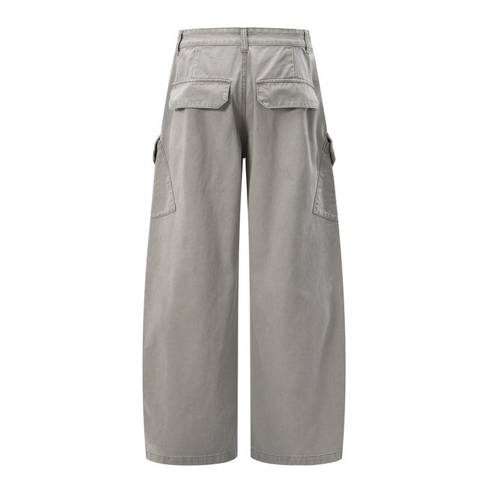 Back view of light gray wide-leg cargo pants with two flap back pockets and side cargo pockets