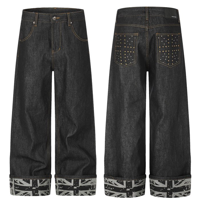 Men's black wide-leg denim jeans with studded back pockets and Union Jack rolled cuffs, front and back view