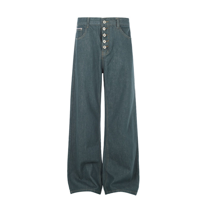 Full front view of teal green wide-leg jeans with a button fly, front pockets, and straight hems