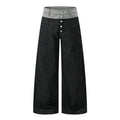 Men's wide-leg black denim jeans with grey colorblock waistband and exposed button fly, front and back view