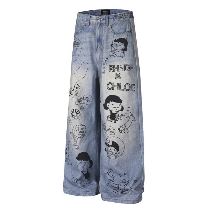 Front view of light blue wide-leg jeans featuring black cartoon figures, text, and comic-style graphics