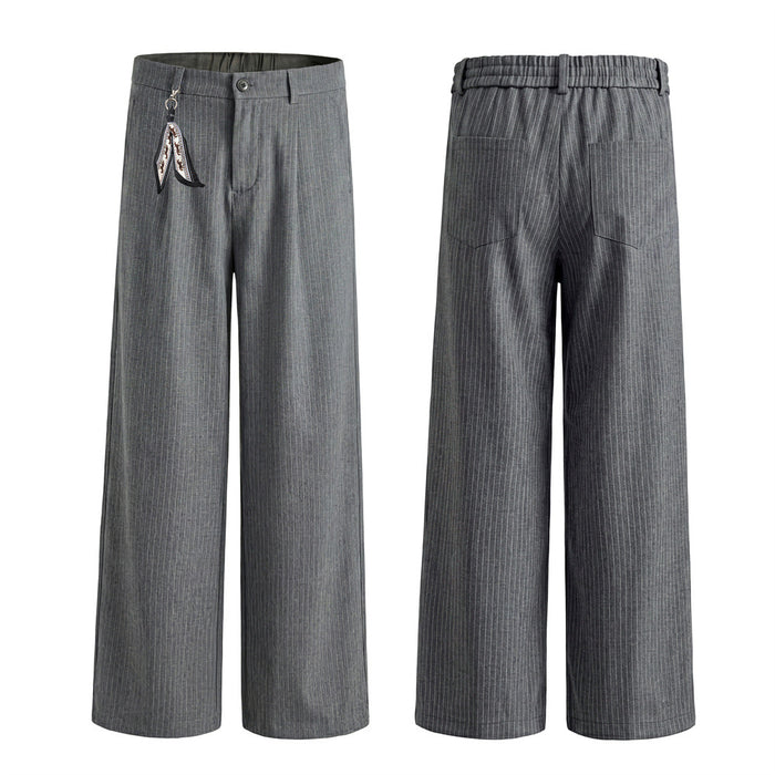 Gray pinstripe wide-leg trousers shown from the front and back with pleats, belt loops and a decorative side charm