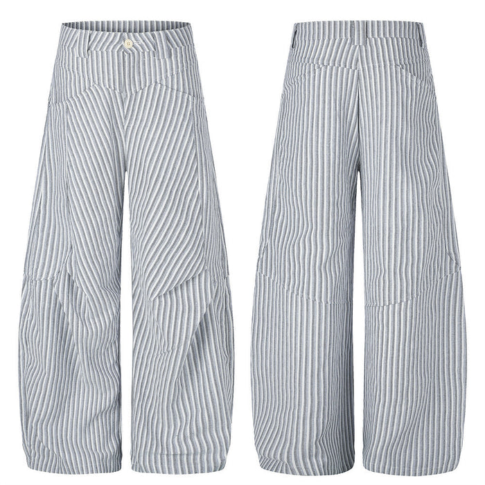 Men's wide-leg blue and white pinstripe trousers with deconstructed multi-directional stripe panels and high waist, front and
