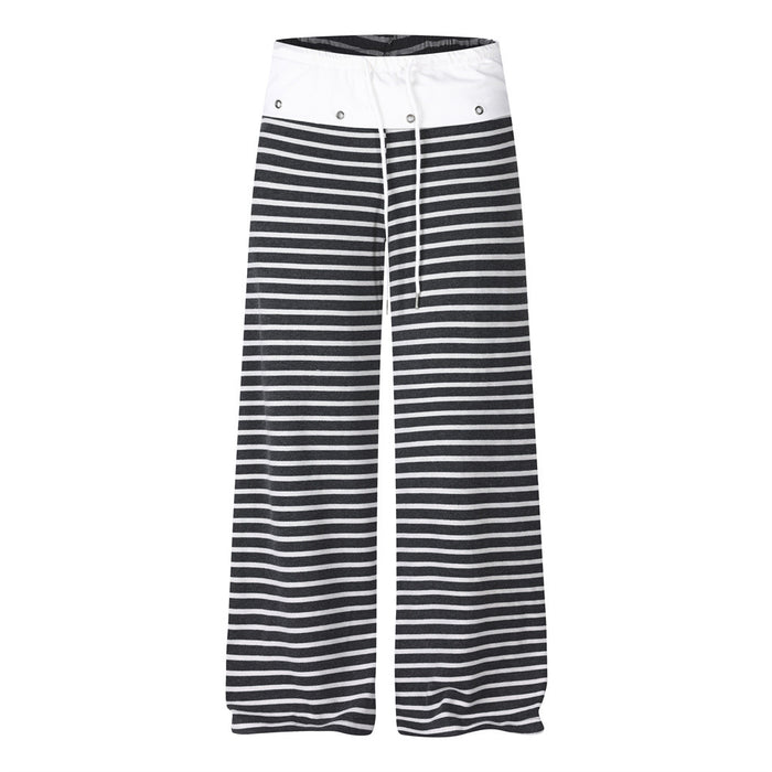 Front view of black and white wide-leg striped pants with a white colorblock waistband and drawstring