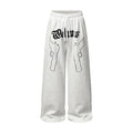Wide-leg sweatpants with gothic Welcome lettering and dual gun outline print on heather grey fleece fabric