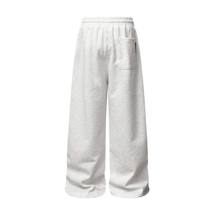 Back view of light gray wide-leg sweatpants showing the elastic waistband and single rectangular rear pocket